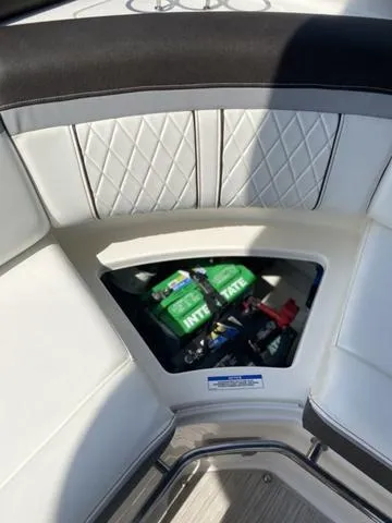 Slide: The Image of 2016 Sea Ray 280 SLX boat interior with battery compartment visible. - 17