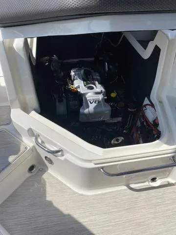 Slide: The Image of Engine compartment of a 2016 Sea Ray 280 SLX boat, featuring a V8 engine. - 18