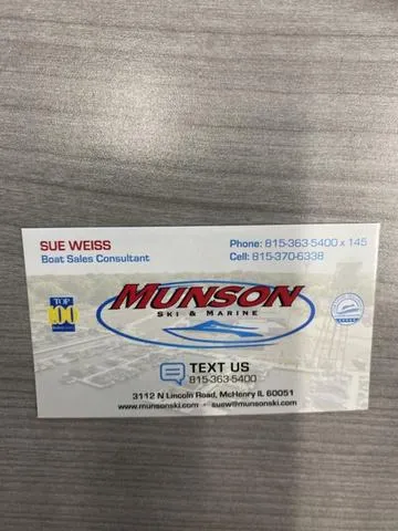 Slide: The Image of Business card for Munson Ski & Marine, featuring contact details for a boat sales consultant. - 19
