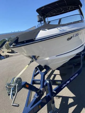 Slide: The Image of 2016 Sea Ray 280 SLX boat on trailer, sunny day, marina background. - 8