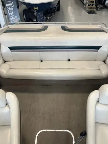 Slide: The Image of 1997 Chaparral 2130 SS boat interior with white leather seating. - 16