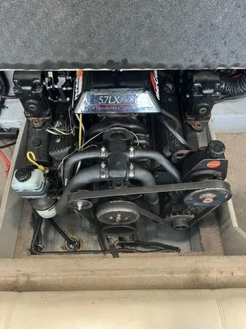 Slide: The Image of Engine of a 1997 Chaparral 2130 SS boat, featuring a 5.7L V8 motor. - 20