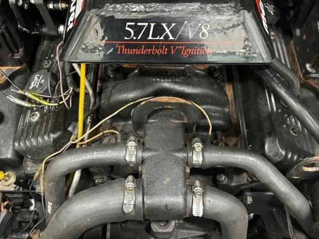 Slide: The Image of 1997 Chaparral 2130 SS engine, 5.7LX V8 with Thunderbolt V Ignition system. - 25