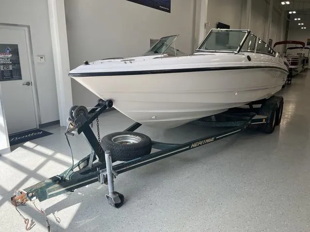 Slide: The Image of 1997 Chaparral 2130 SS boat on trailer in showroom. - 3
