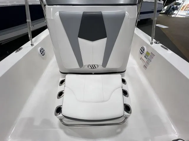 Slide: The Image of 2024 Robalo 206 Cayman boat seating area with modern design and cup holders. - 14