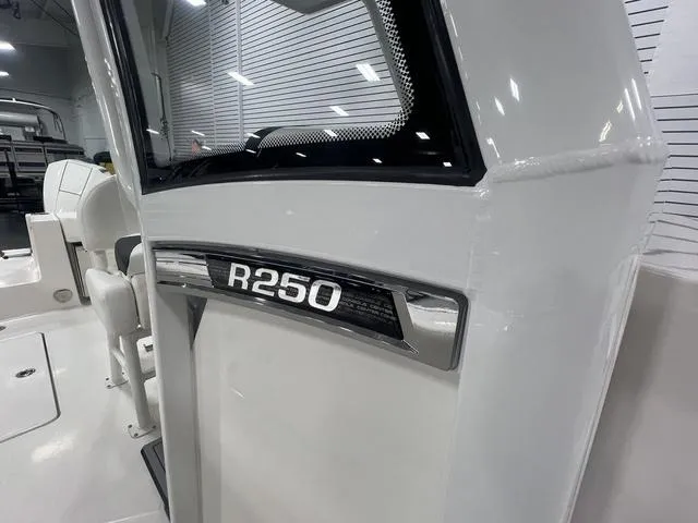 Slide: The Image of 2024 Robalo R250 boat interior, showcasing sleek design and modern features. - 31