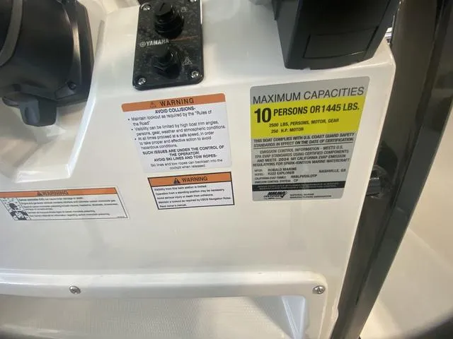 Slide: The Image of 2024 Robalo R222EX boat capacity label, showing maximum 10 persons or 1445 lbs. - 11