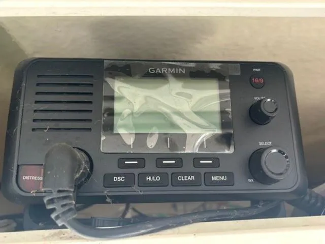 Slide: The Image of Garmin marine radio on 2021 Robalo R222 boat dashboard. - 16