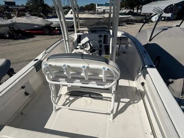 Slide: The Image of 2021 Robalo R222 boat interior with steering console and seating. - 9