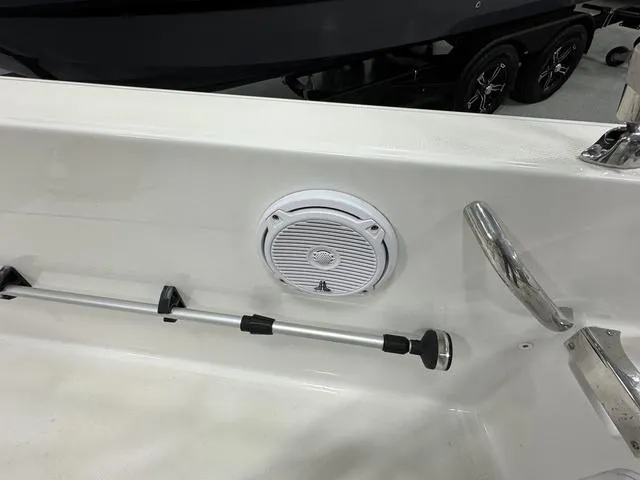 Slide: The Image of 2019 Edgewater 170CC boat interior with mounted speaker and railing. - 10