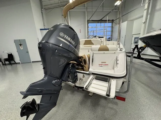 Slide: The Image of 2019 Edgewater 170CC boat with Yamaha outboard motor in showroom. - 4