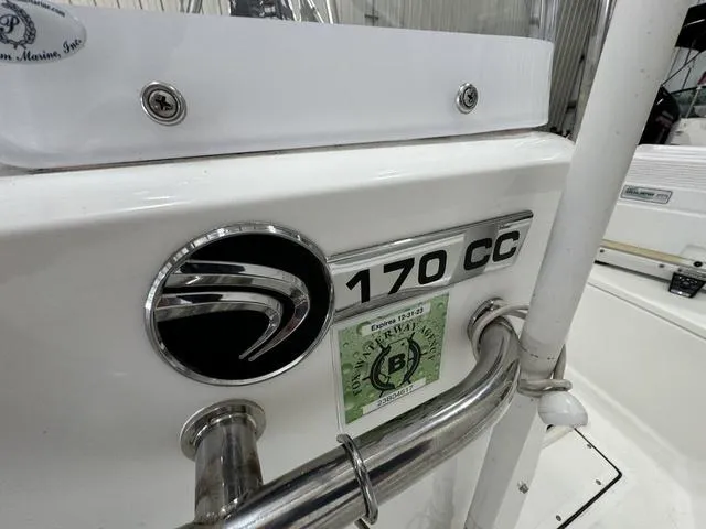 Slide: The Image of Edgewater 170CC 2019 boat console with logo and registration sticker. - 9