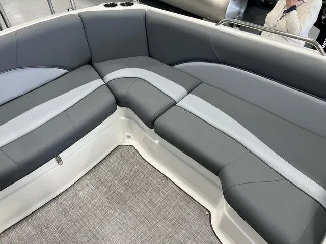 Slide: The Image of 2023 NauticStar 203 SC boat interior with gray seating and modern design. - 9
