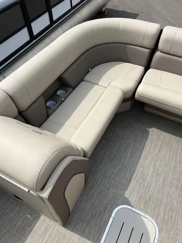 Slide: The Image of 2024 Bentley Pontoons Elite 223 Admiral 3/4 Tube, luxurious seating area, beige upholstery. - 10