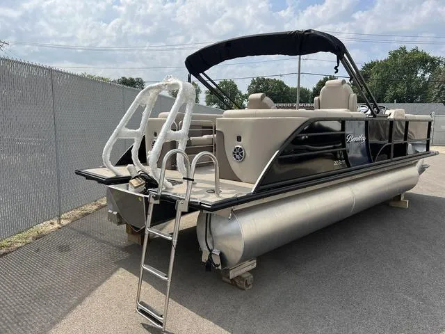 Slide: The Image of 2024 Bentley Pontoons Elite 223 Admiral 3/4 Tube, black exterior, docked on pavement. - 7