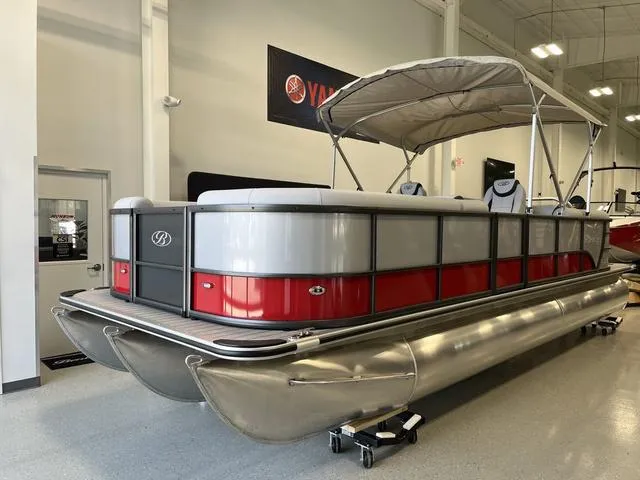 Slide: The Image of 2024 Bentley Pontoons Legacy 243 Navigator 3/4 Tube in showroom display. - 0