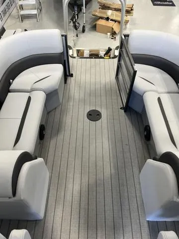 Slide: The Image of 2024 Bentley Pontoons Legacy 243 Navigator interior with gray seating and flooring. - 8