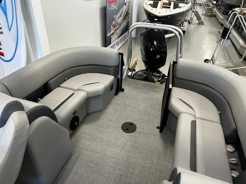 Slide: The Image of 2025 Bentley Pontoons 223 NAVIGATOR interior with gray seating and modern design. - 8