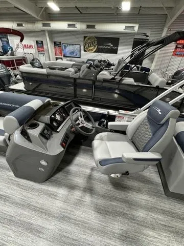 Slide: The Image of 2025 Bennington 23 SSR pontoon boat interior with modern helm and seating. - 17