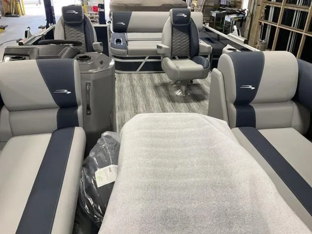 Slide: The Image of 2025 Bennington 23 SSB pontoon boat interior with luxurious seating and modern design. - 6