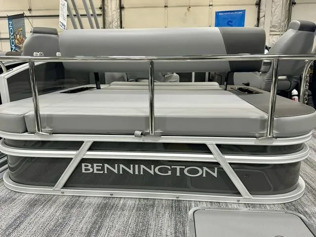 Slide: The Image of 2025 Bennington 22 SSB pontoon boat with sleek gray seating and railing. - 19