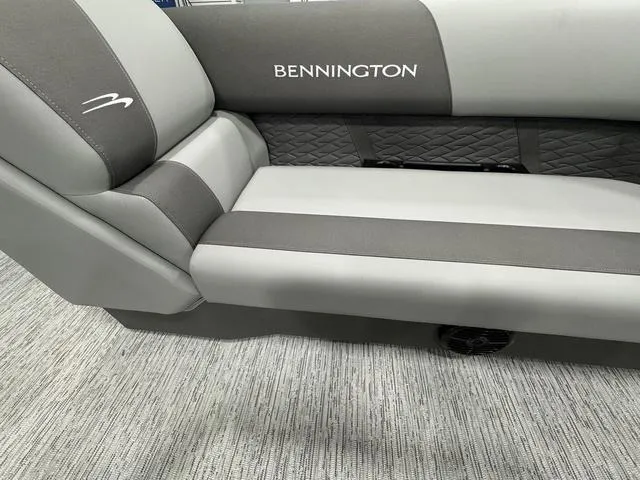 Slide: The Image of 2025 Bennington 22 SSR boat seat with gray upholstery and logo detailing. - 17