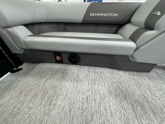 Slide: The Image of 2025 Bennington 22 SSR boat interior with sleek gray seating and modern design. - 20