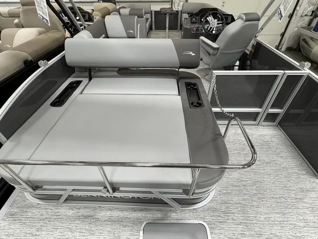 Slide: The Image of 2025 Bennington 22 SSB pontoon boat interior with gray seating and modern design. - 18
