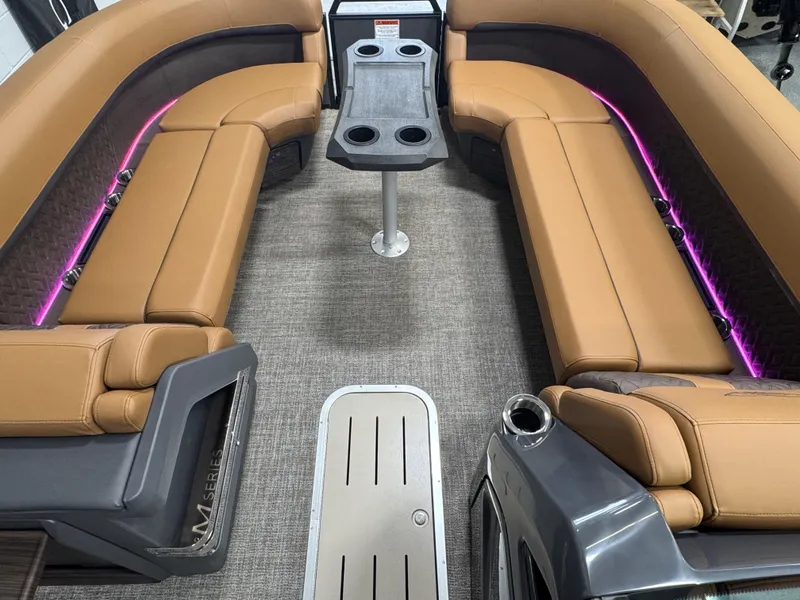 Slide: The Image of Luxurious interior of 2025 Bennington M Swingback 24 MSB with plush seating and ambient lighting. - 19
