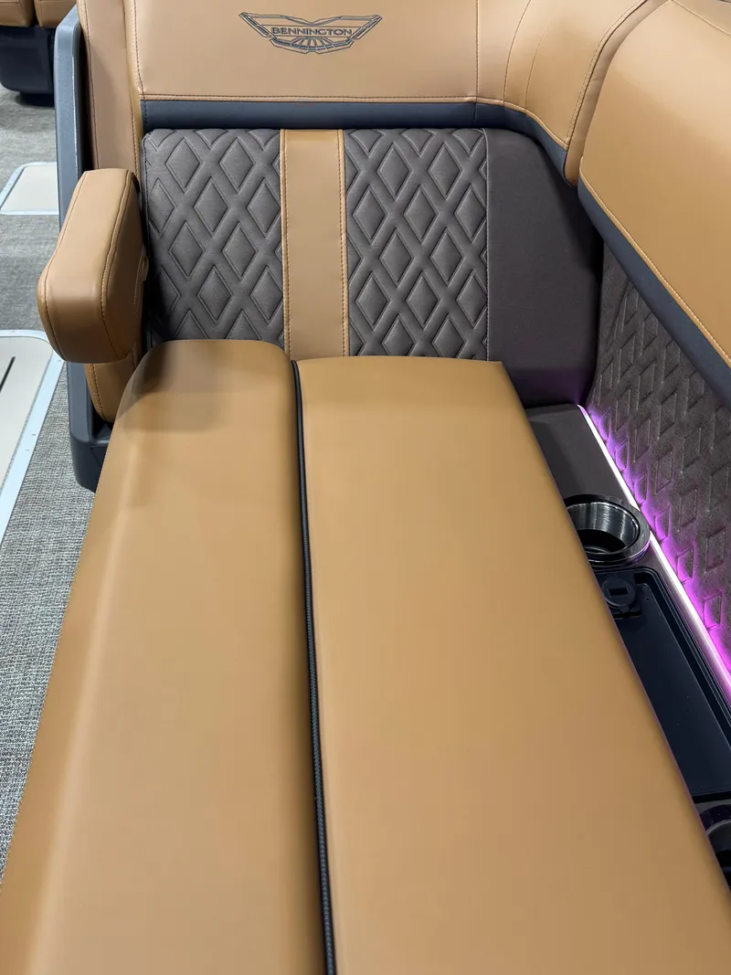 Slide: The Image of 2025 Bennington M Swingback 24 MSB interior with tan and gray diamond-stitched seating. - 22