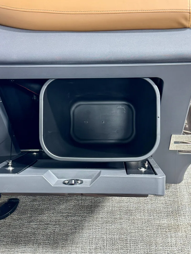 Slide: The Image of Storage compartment in 2025 Bennington M Swingback 24 MSB boat, featuring sleek design and functionality. - 27