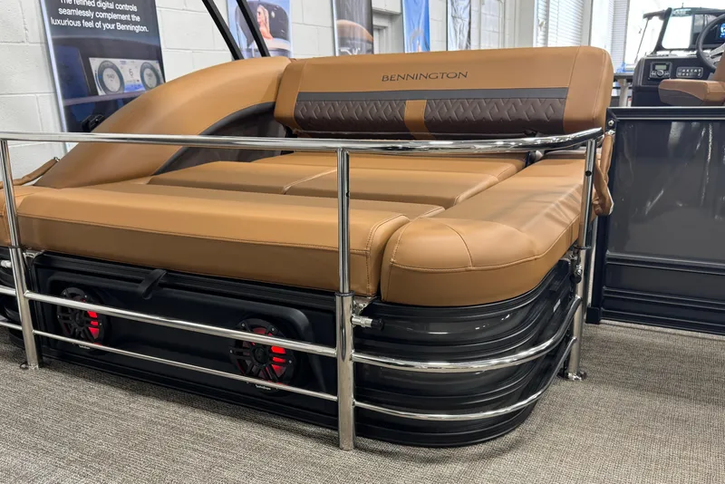 Slide: The Image of 2025 Bennington M Swingback 24 MSB boat interior with tan seating and sleek design. - 33