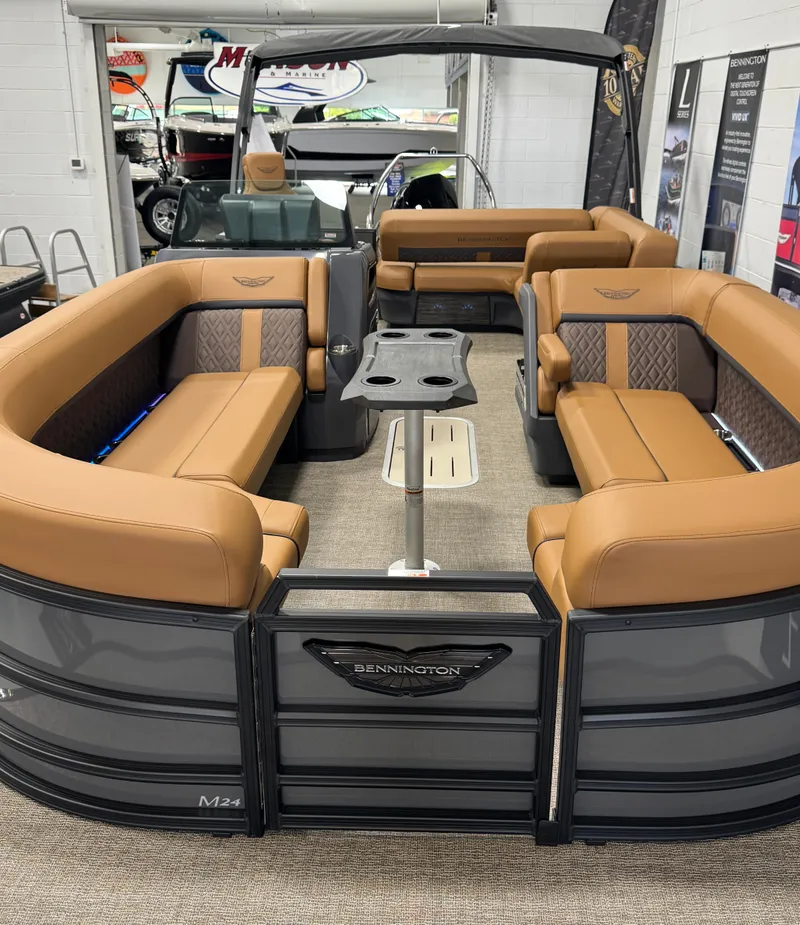 Slide: The Image of 2025 Bennington M Swingback 24 MSB pontoon boat with luxurious seating and modern design. - 4