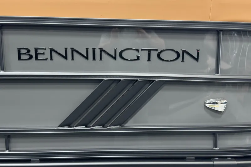 Slide: The Image of 2025 Bennington M Swingback 24 MSB logo on sleek gray panel. - 5