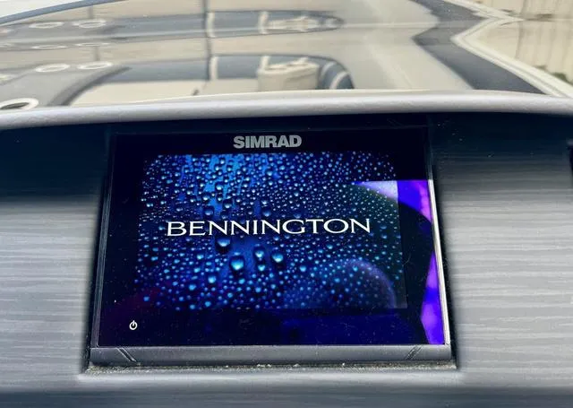 Slide: The Image of Simrad display screen in 2022 Bennington 25 LTSB boat dashboard. - 12