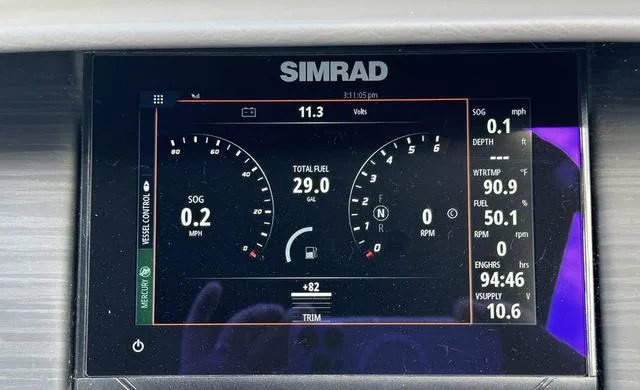 Slide: The Image of Simrad display on 2022 Bennington 25 LTSB showing speed, fuel, and engine data. - 14