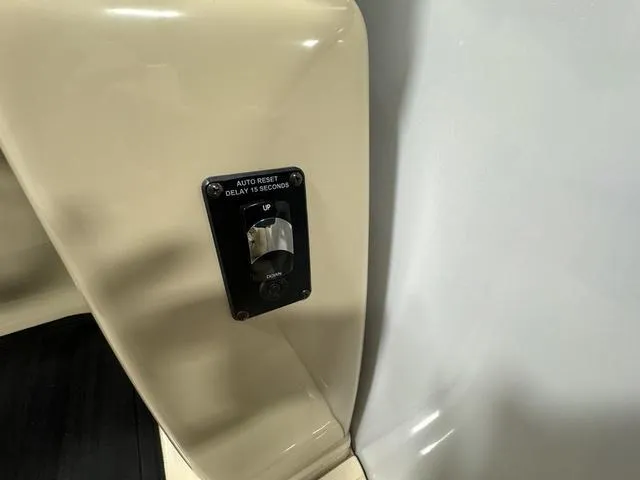 Slide: The Image of Control panel with auto reset switch on 2019 SunChaser 8525 Entertainer boat. - 13