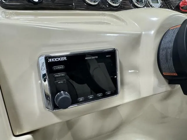 Slide: The Image of Kicker media center in 2019 SunChaser 8525 Entertainer boat dashboard. - 15