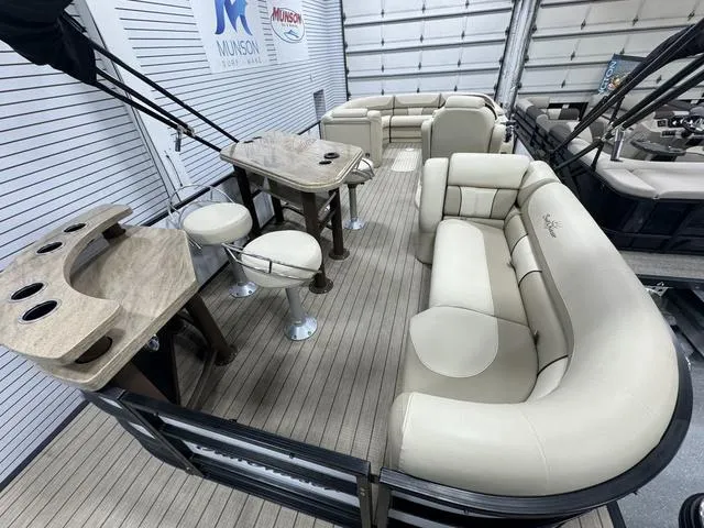 Slide: The Image of 2019 SunChaser 8525 Entertainer pontoon boat with luxurious seating and entertainment area. - 6