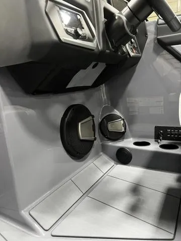 Slide: The Image of 2024 Axis Wake Research A245 interior with speakers and control panel. - 11