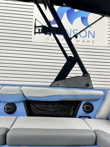 Slide: The Image of 2024 Axis Wake Research T250 boat interior with blue and gray seating. - 15