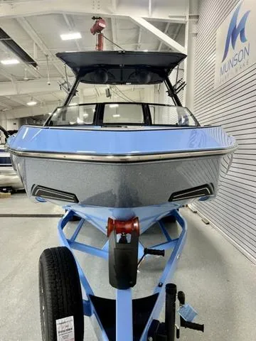 Slide: The Image of 2024 Axis Wake Research T250 boat in showroom, front view. - 3
