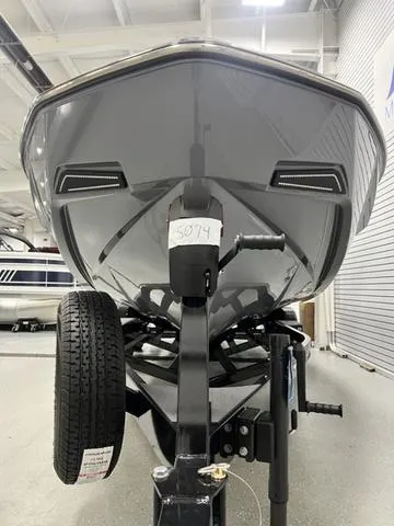 Slide: The Image of 2024 Axis Wake Research T250 boat on trailer in showroom. - 6