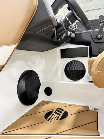 Slide: The Image of 2024 Malibu 22 LSV interior, featuring tan leather seats and modern dashboard design. - 12