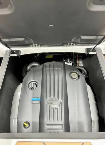 Slide: The Image of 2024 Malibu 22 LSV engine compartment, showcasing a powerful inboard motor. - 18