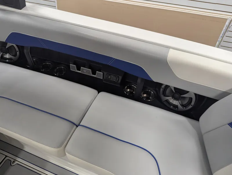 Slide: The Image of Interior seating of 2021 Malibu Wakesetter 20 VTX boat with speakers and cup holders. - 10