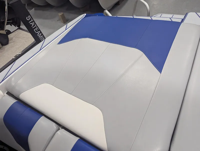 Slide: The Image of 2021 Malibu Wakesetter 20 VTX boat seat with blue and gray upholstery. - 18