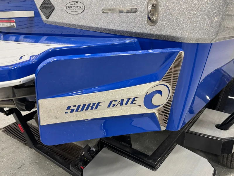 Slide: The Image of 2021 Malibu Wakesetter 20 VTX with Surf Gate feature, blue and silver detailing. - 5