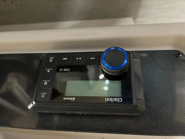 Slide: The Image of Clarion Bluetooth audio system in a 2025 Godfrey 2286SFLX boat. - 8