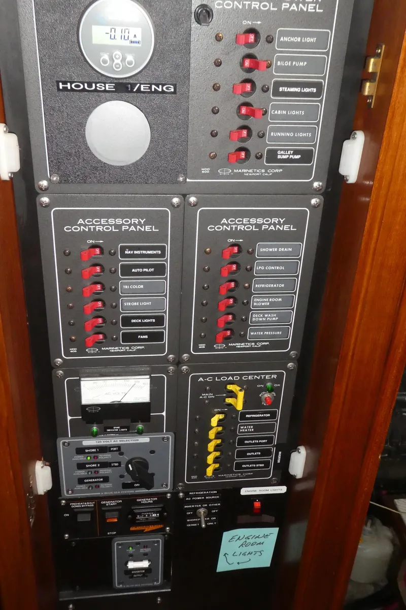 Slide: The Image of Electrical control panel on a 1990 Celestial 48 Center Cockpit sailboat. - 30